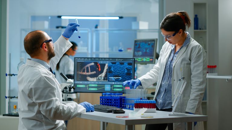 medical-scientist-working-with-dna-scan-image-BHRCSWL (1)-min