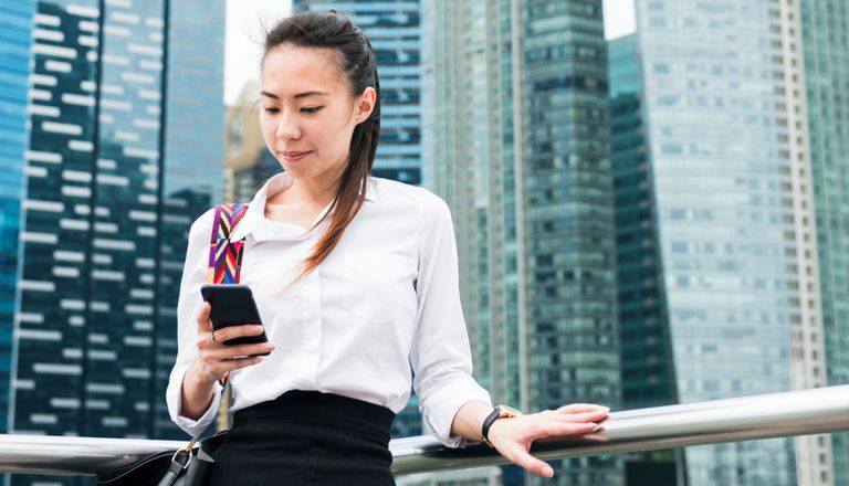 asian-businesswoman-in-a-city-2021-08-27-00-04-56-utc